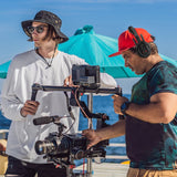 SYNCO Xtalk XPro communication headset for video production on the beach.